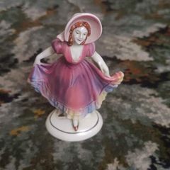 Vintage porcelain lady figurine with hat