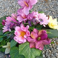 Elegant faux flowers grave arraignments