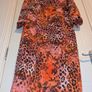 beautiful Louise wrap animal print midi dress from Girl in Mind Image 2