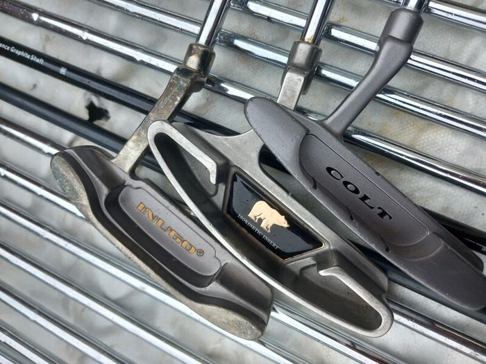 A selection of golf clubs and bags. NOT SELLING SEPARATE