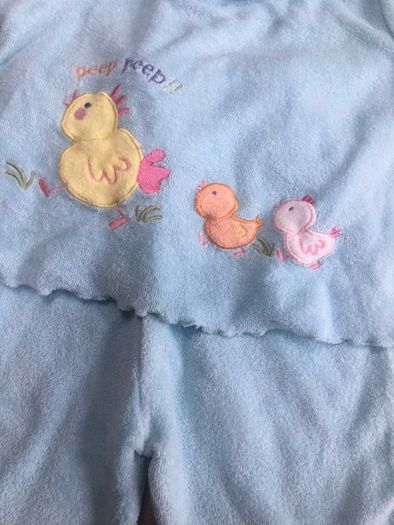 Baby suit with rattles in the toes.  0-3 months.