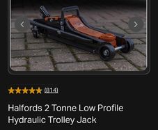 low hydrolic car jack. Never used and In perfect order