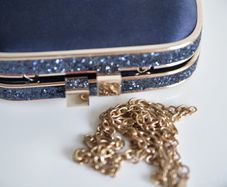 Navy rose gold clutch bag