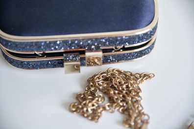 Navy rose gold clutch bag
