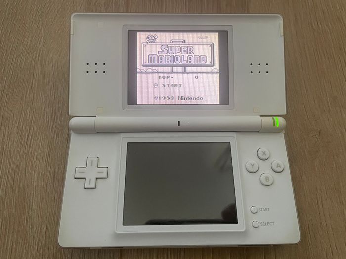 Modded Nintendo DS Lite crystal white USG 001 boxed with manual with Flash Card 32gb with Games and retro games (Neo Geo, Nes, Gameboy Color, Atari.
