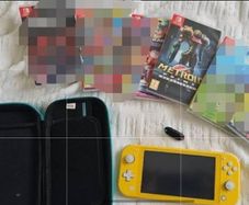 Nintendo Switch Lite Yellow with metro is prime and accessories