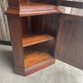 A tall mahogany corner cabinet. Image 4