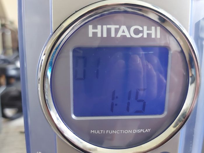 HITACHI Music System, Model AX-M67, & 2 Hitachi 4 Ohm Speakers, Radio, CD and AUX, in very good condition
