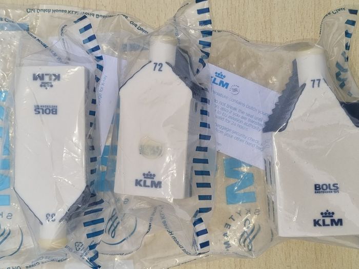 Collection of 7 porcelain miniature KLM Delft Blue houses