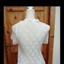 A. Wear white 100% cotton wrap over cardigan. Image 2