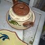 A Lot of Longpark Torquay pottery including a teapot featuring a brown glazed lid and spout.It is a "mottoware" piece from England, dated between 1905 and 1923, Image 3