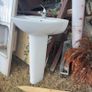 Bathroom sink and toilet Image 2