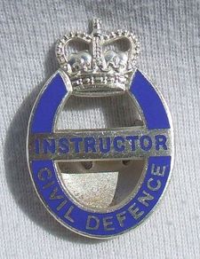 CIVIL  DEFENCE INSTRUCTOR lapel badge (1950's - 1960's) in really nice condition.