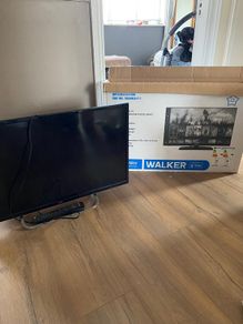 slection of clothes footwear and a tv.