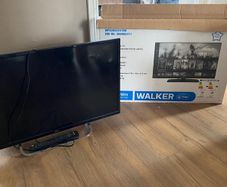 slection of clothes footwear and a tv.