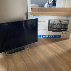 slection of clothes footwear and a tv.