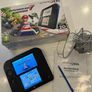 Nintendo 2ds with box and Mario kart game Image 2