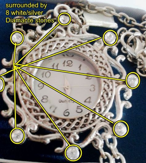 Ladies Quartz Necklace Watch with Filigree Design on Casing and Surrounded by 8 White-Silver Diamante Stones.