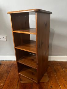 Rotating book CD shelf