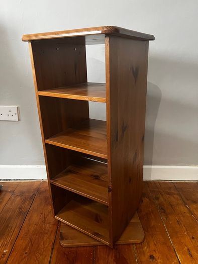 Rotating book CD shelf