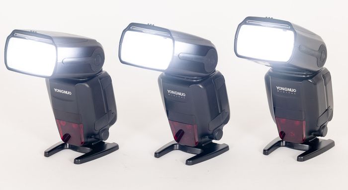 Three Yongnuo YN600EX-RT II flashguns with bag and accessories