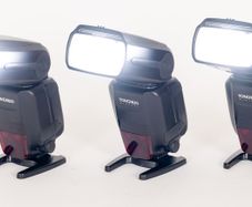 Three Yongnuo YN600EX-RT II flashguns with bag and accessories