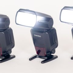 Three Yongnuo YN600EX-RT II flashguns with bag and accessories