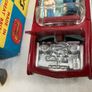 Corgi. Chrysler Imperial 246. With golf cart, driver snd passenger. Car and box are mint condition. Image 6