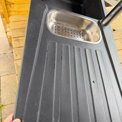 kitchen sink. Black composite double bowl kitchen sink with stainless steel mixer taps 1000mm lx 500mm