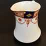 Milk Jug and Saucer Image 4