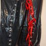 stunning PVC dress with red ribbon lace up detail in front Image 4