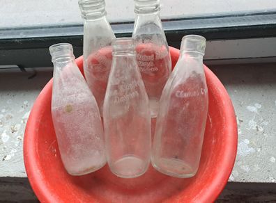 5 Milk bottles