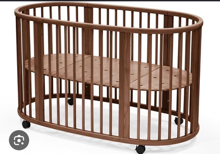 Stokke Changing table and cot in warm brown colour