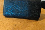 black Dewest zipper wallet.