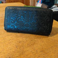 black Dewest zipper wallet.