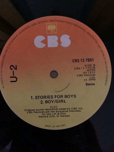 U2 - "Three" - 12" Vinyl  from 1979 - CBS 12-7951 - Second Release - Plain Black Sleeve, CBS Sunburst Labels