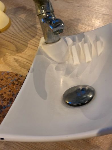 Small used bathroom sink