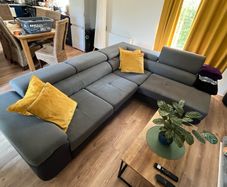 Sofa bed with reclining headrests