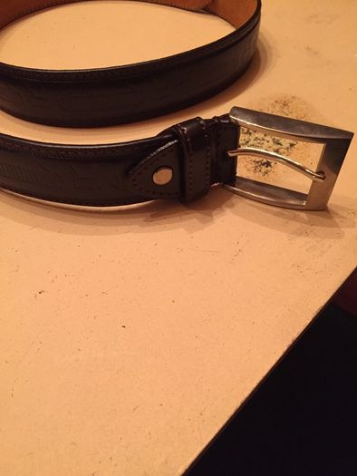 Selecting of men's black/brown belts