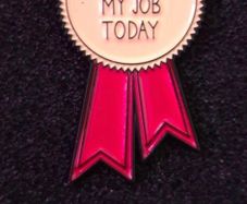 Didn't quit my job today, pin back badge.