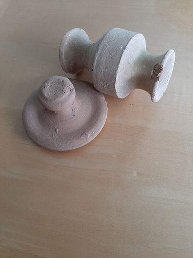 Small terracotta model vase