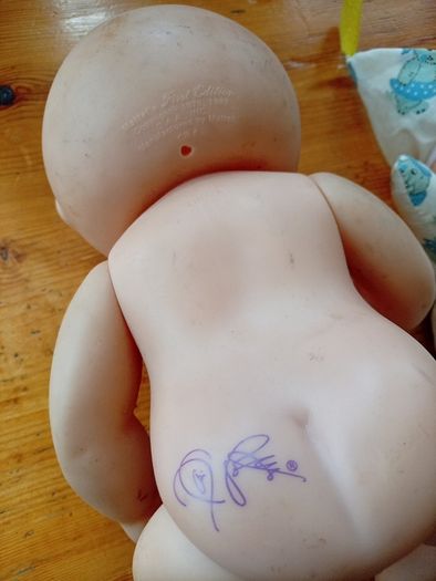 Cabbage patch doll and glo worm doll