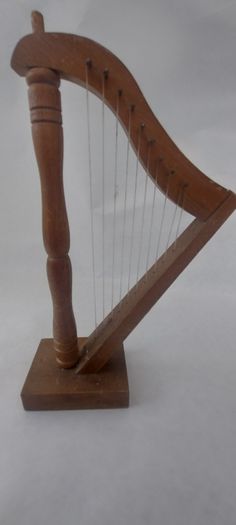 handcrafted wooden display harp ,,lovely display item for any man cave pub restaurant etc etc etc, buyer collects or pays postage.