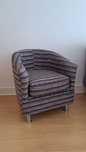 Vintage style floor lamp with chair and bookshelf