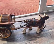 Ceramic heavy horse & carriage with carlsberg advertisement .