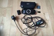 Working psp 2000 + 4gb memory card + carry case + games