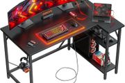 L Shaped Gaming Desk with Power Outlets, 120x70cm Computer Table Small Corner Desk with Large Reversible Storage Shelves, Home Office PC Workstation with Hooks for Writing Study, Black