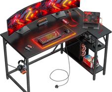 L Shaped Gaming Desk with Power Outlets, 120x70cm Computer Table Small Corner Desk with Large Reversible Storage Shelves, Home Office PC Workstation with Hooks for Writing Study, Black