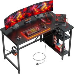 L Shaped Gaming Desk with Power Outlets, 120x70cm Computer Table Small Corner Desk with Large Reversible Storage Shelves, Home Office PC Workstation with Hooks for Writing Study, Black