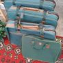 Four Matching Suitcases Image 2